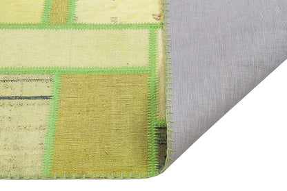 Handmade Green Patchwork Rug: 100% Wool Turkish Area Rug (3.9x5.6 ft)