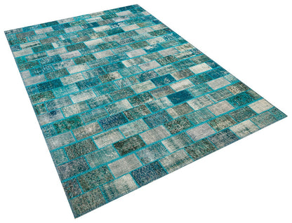 Handmade Green Wool Patchwork Rug: Bohemian Turkish Rug (5.4x7.9 ft)