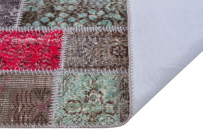 Handmade Wool Patchwork Rug: Bohemian Turkish Area Rug (5.6x7.7 ft)