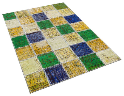 Handmade Wool Patchwork Rug: Bohemian Turkish Area Rug (3.9x5.7 ft)