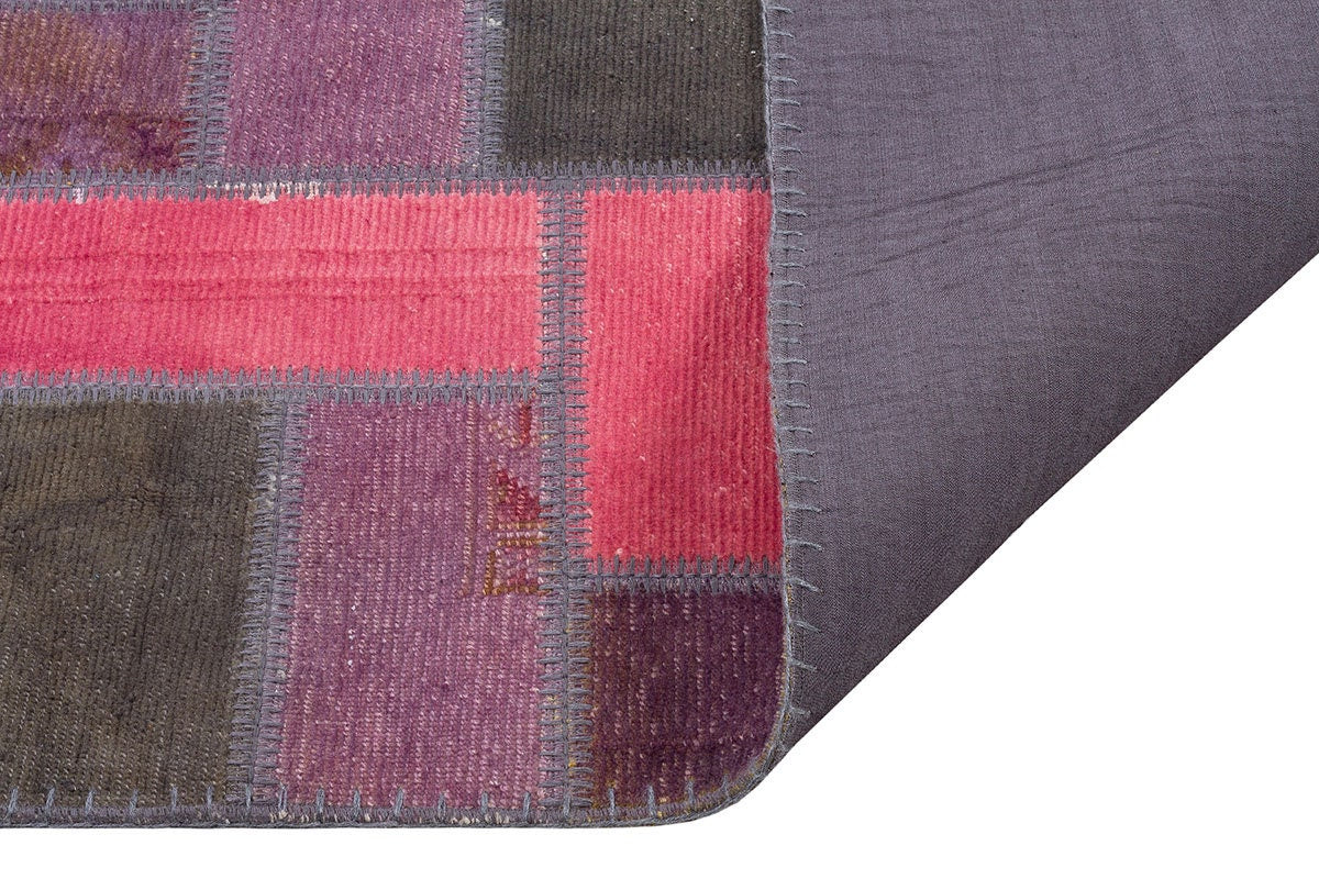 Handmade Wool Patchwork Rug: Bohemian Turkish Area Rug (5.6x7.7 ft)