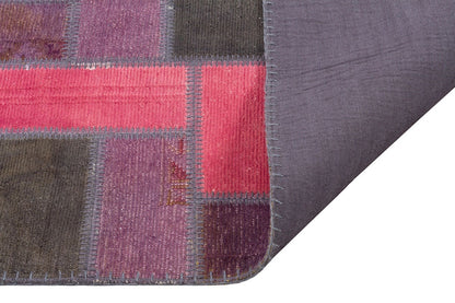 Handmade Wool Patchwork Rug: Bohemian Turkish Area Rug (5.6x7.7 ft)