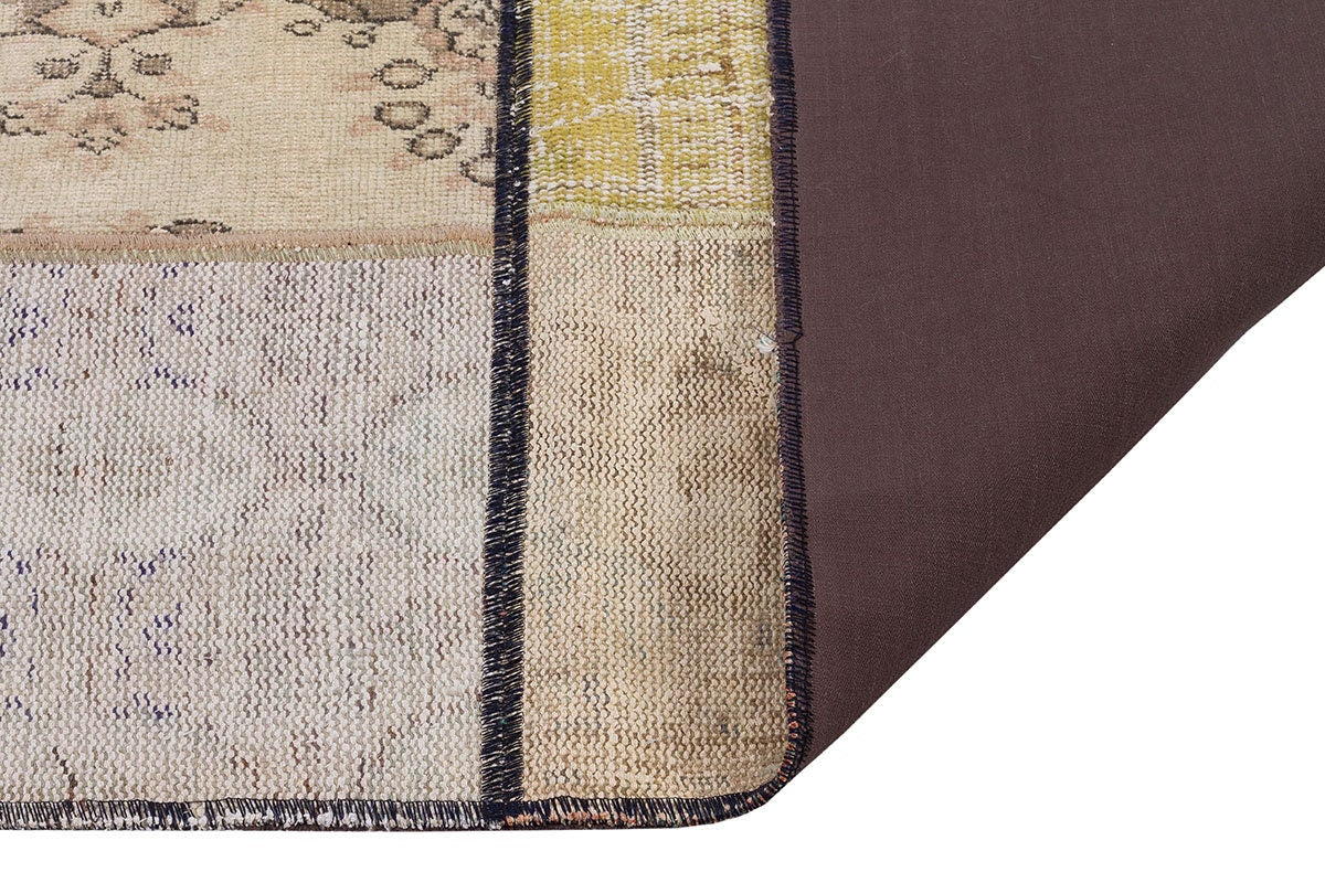 Handmade Patchwork Turkish Rug: Bohemian Wool Area Rug (4.4x5.4 ft)