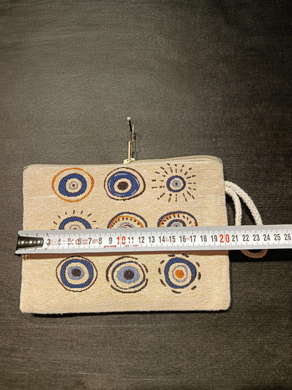 Handmade Evil Eye Gobelin Pouch – Turkish Nazar Clutch with Neutral Beige Background