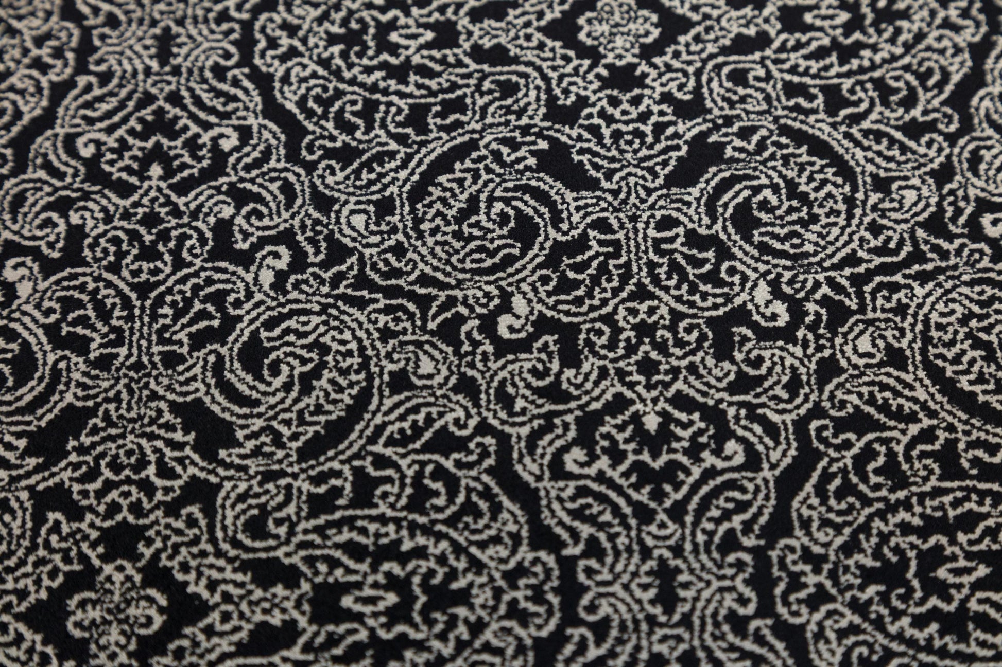 7x10 ft, Black Classic Silk Rug with paisley desing on the border, fine fringes