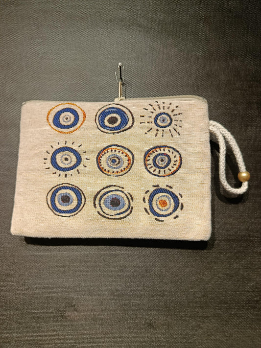 Handmade Evil Eye Gobelin Pouch – Turkish Nazar Clutch with Neutral Beige Background