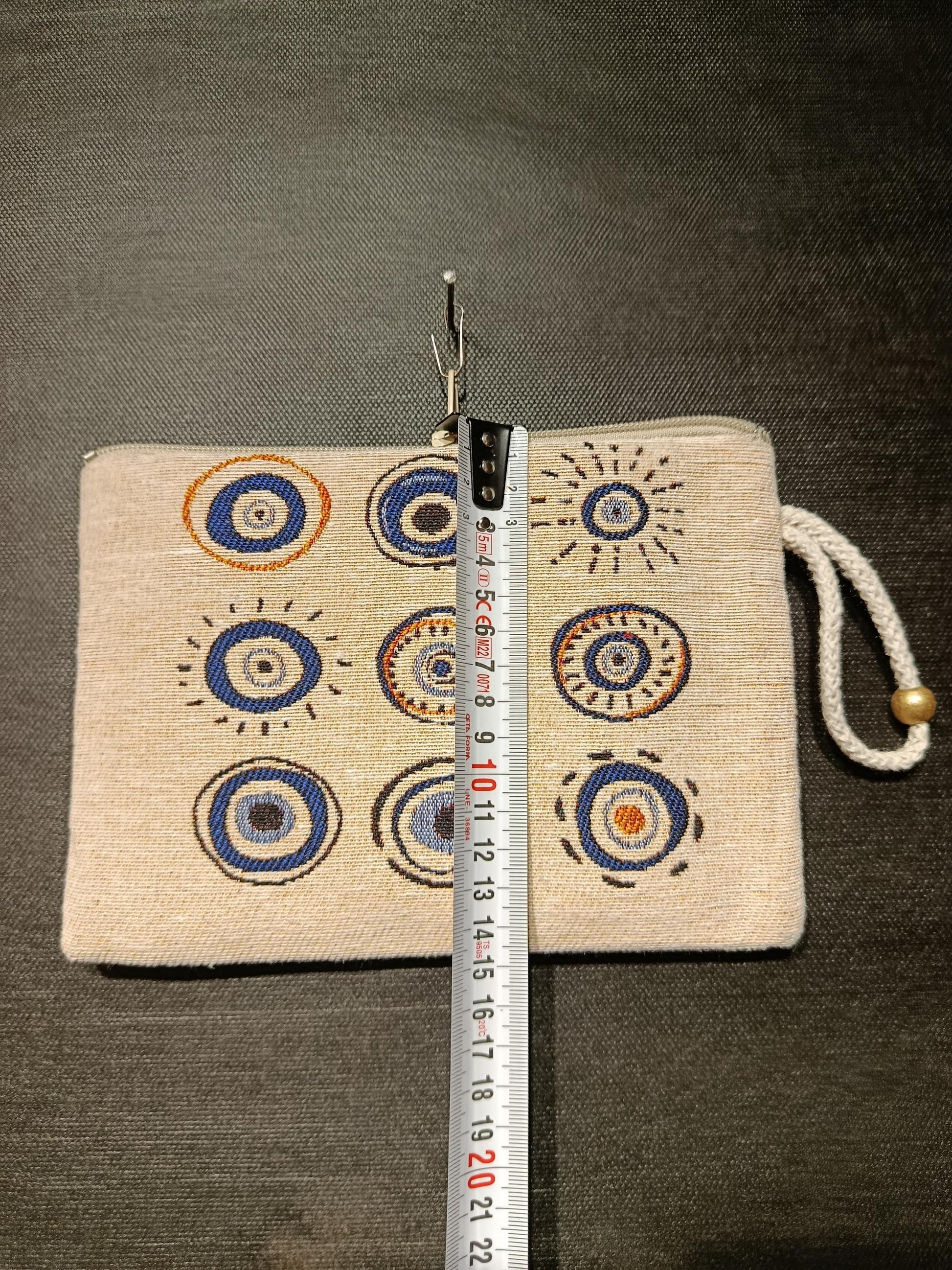 Handmade Evil Eye Gobelin Pouch – Turkish Nazar Clutch with Neutral Beige Background