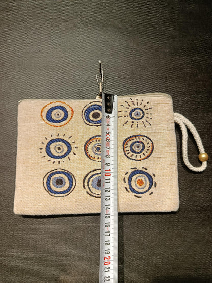 Handmade Evil Eye Gobelin Pouch – Turkish Nazar Clutch with Neutral Beige Background