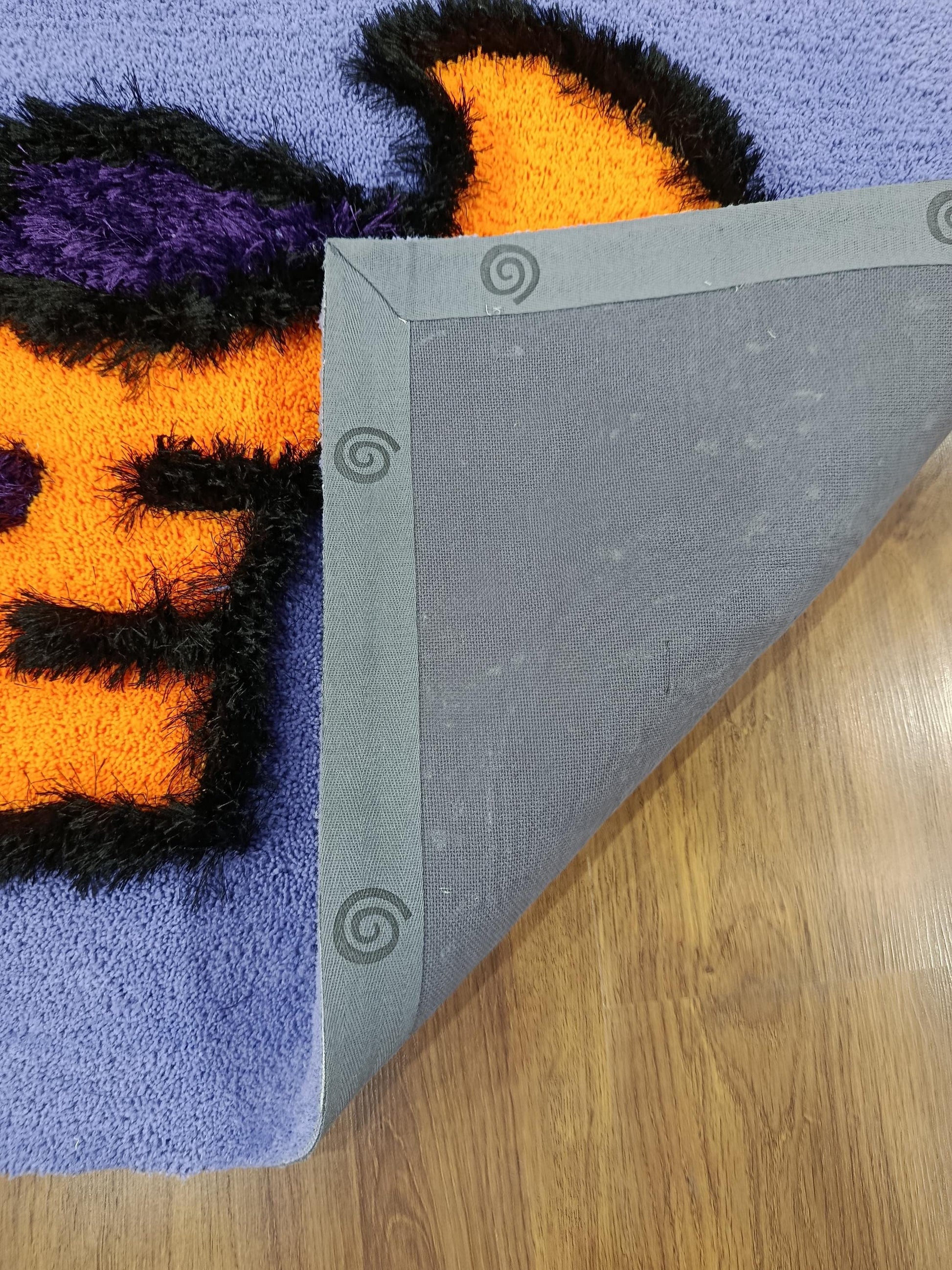 Handtufted Motorcycle Rug: Purple Kids Playroom Carpet with Orange Accents