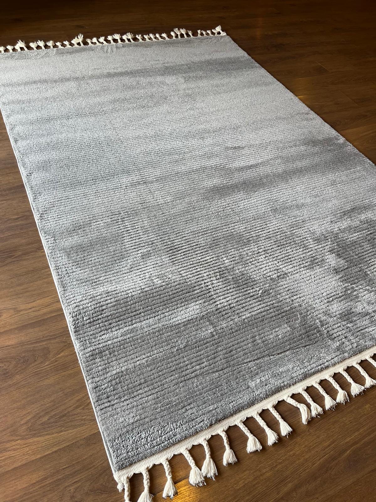 Fluffy Gray Area Rug: Modern Washable Plain shaggy rug with tossels
