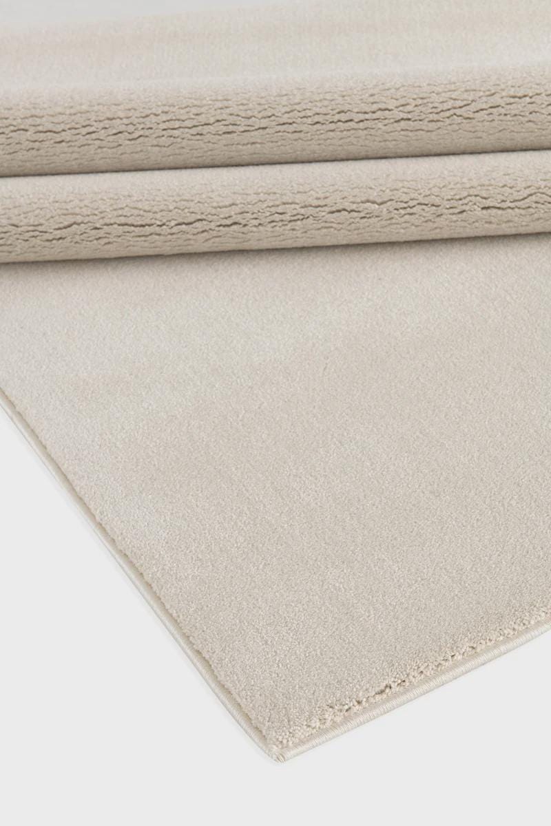 Soft Cream Minimalist Rug: Modern Light Carpet for Contemporary Spaces