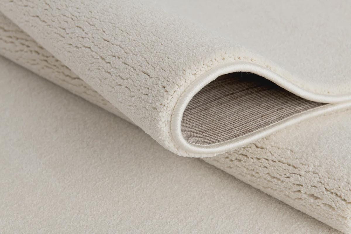 Soft Cream Minimalist Rug: Modern Light Carpet for Contemporary Spaces