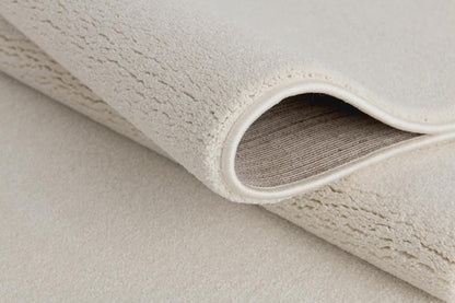 Soft Cream Minimalist Rug: Modern Light Carpet for Contemporary Spaces